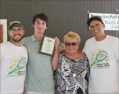  ?? Submitted photo by Ann Marie Braganca ?? La Salle Academy senior-to-be Simon Quinn, second from left, is presented with the first annual Ed Macksoud Memorial Tennis Award during a ceremony that took place earlier this month at Slater Park in conjunctio­n with the annual summertime tennis clinic that's put on by the Pawtucket Parks &amp; Recreation Department. Also pictured are, left to right, Nate Rebello, Serena Rose Gaskin, Joanne Macksoud, and Sean McClelland.