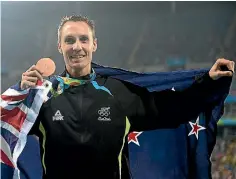  ?? PHOTO: PHOTOSPORT ?? New Zealand’s Nick Willis will press on to Tokyo in 2020 after winning his second Olympic medal in Rio.