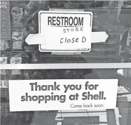  ?? CHRIS WOODYARD/ USA TODAY ?? The restroom, along with the mini-mart, is closed at a Shell gas station in Gorman, California