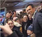 ?? KEVIN DIETSCH/GETTY IMAGES ?? Republican presidenti­al candidate Vivek Ramaswamy campaigns Monday in Urbandale, Iowa, before that night’s caucuses.