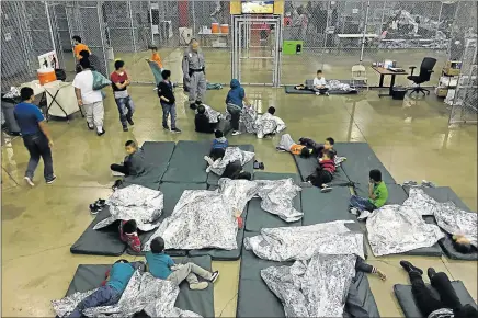  ?? Picture: AFP ?? TRAUMATIC EXPERIENCE: Children of illegal migrants caught at the border of Mexico by US Border Patrol agents, at the Central Processing Centre in McAllen, Texas. A US judge ordered that families separated at the border under President Donald Trump's...