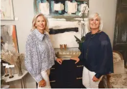  ?? STAFF PHOTO BY MATT HAMILTON ?? Susan Reynolds, left, and Jamie Rehm pose in June at Bud Floral + Home, a business they opened in 2019.