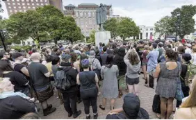  ?? THE CANADIAN PRESS ?? People attend a rally in Halifax’s Cornwallis Park to show solidarity with Charlottes­ville after a protest staged by white supremacis­t groups sparked a counter protest and the weekend erupted in violence that left one person dead.