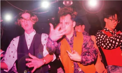  ?? Photograph: Peter J Walsh/Pymca/ Shuttersto­ck ?? ‘Nightclubs act as joyous escape routes’: clubbers on the Haçienda dancefloor in Manchester in 1988.