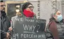  ?? PAT NABONG/SUN-TIMES ?? Pilsen residents protest sharp property tax hikes outside City Hall last December.