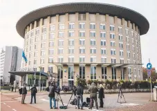  ?? Picture: AFP ?? Journalist­s wait outside the Organisati­on for the Prohibitio­n of Chemical Weapons HQ in The Hague during a meeting about Britain-Russia spy poisoning allegation­s.