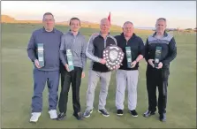  ?? ?? Dunaverty Golf Club captain Donald Brown, Southend, centre, with the winners, from left: Kenny Cameron, Scott Cameron, Ross Sinclair and Roddy MacDonald.