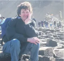  ?? LINDA CHOYCE ?? A pensive Lesley Choyce conducts research at Giant's Causeway in Ireland for his next, 101st, book.