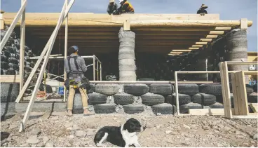  ?? ?? A new Earthship, the Unity model, is designed to incorporat­e cost-cutting measures,
such as one layer of windows.