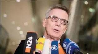  ?? —AP ?? BERLIN: German Interior Minister Thomas de Maiziere speaks about the arrest of heads of a group called Avalanche on Thursday.