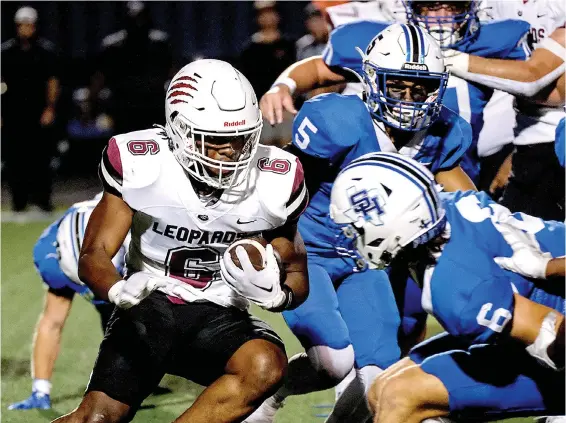  ?? ?? Liberty-eylau running back Greg London runs the ball against Spring Hill on Oct. 6 at Panther Stadium in Longview, Texas. (Photo by Michael Cavazos/news-journal)