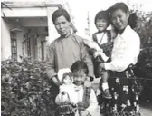  ??  ?? ABOVE: Linda, 3, with her family in Hong Kong in 1949 after they escaped China.