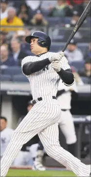  ?? Julie Jacobson / Associated Press ?? Giancarlo Stanton fouls off a pitch during the first inning against Miami last Monday.