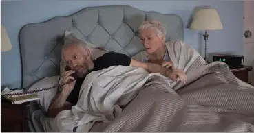  ?? Graeme Hunter Pictures/Sony Pictures Classics ?? Glenn Close, right, and Jonathan Pryce in “The Wife.”