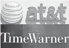  ??  ?? The Department of Justice could announce as early as this week that it will challenge AT&T’s acquisitio­n of Time Warner. SAUL LOEB AFP/GETTY IMAGES