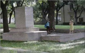  ?? ERIC GAY — THE ASSOCIATED PRESS ?? In this file photo, a pedestal wrapped in plastic that had held a statue of Confederat­e Gen. Robert E. Lee which was removed from the University of Texas campus in Austin, Texas.