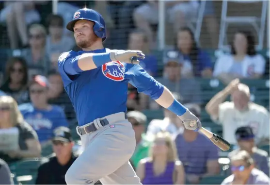  ?? | CHRIS CARLSON/ AP ?? Switch- hitting outfielder Ian Happ is making a strong case in the Cactus League to become the Cubs’ primary leadoff hitter this season.