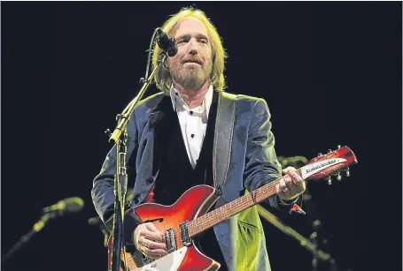  ??  ?? Tom Petty and the Heartbreak­ers performing at the Isle of Wight Festival.