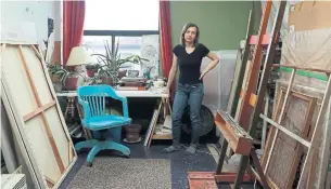  ??  ?? Dorota Dziong has “a lifetime” of artwork stacked in the spacious studio apartment she has called home since 2009. She says she “wouldn’t know where to start” if she was forced to move.