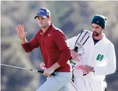  ??  ?? AUGUSTA: Thomas Pieters of Belgium waves on the 18th green during the second round of the 2017 Masters Tournament at Augusta National Golf Club on Friday in Augusta, Georgia. — AFP