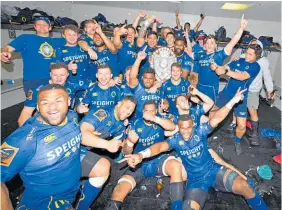  ?? Photo / Photosport ?? Jubilant Otago players celebrate taking the Ranfurly Shield off Waikato in Hamilton yesterday.