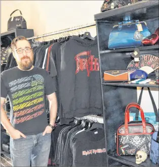  ?? KENN OLIVER/THE TELEGRAM ?? Louis O’quinn and his wife Jenny Macpherson used the Posie Row & Co opportunit­y to launch Dead Issue, a store specializi­ng in rock, punk and metal band merchandis­e as well as other spooky styles and accessorie­s.