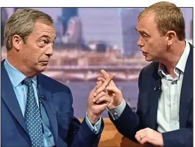  ??  ?? Exchange: Farage and Farron clash on the BBC’s Andrew Marr show