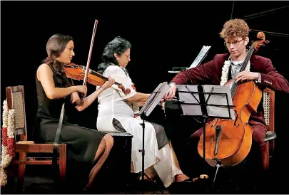  ??  ?? Letting themselves go with the music (left to right): Mandhira, Ramya and Joshua. Pix by M.A. Pushpa Kumara