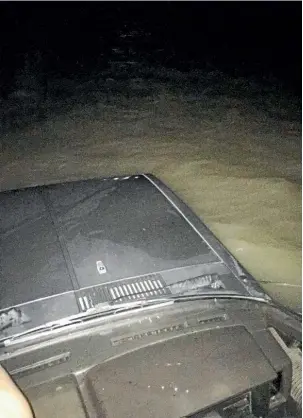  ??  ?? A photo of the near submerged 4WD on the Ashley River in North Canterbury, from which Savannah Davies was swept away.