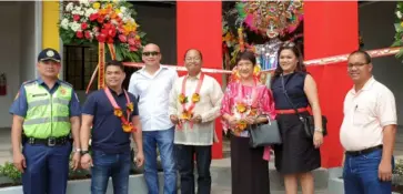  ?? CARLA CAÑET ?? BACOLOD City Councilor Bart Orola (center), first lady Elsa Leonardia (3rd from right) with owners Bryan and Sheryl Dueñas (3rd and 6th from right) and guests during the opening of the BSD Building at Barangay Mansilinga­n in the city yesterday.