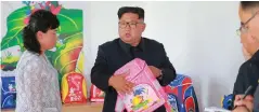  ?? (KCNA via REUTERS) ?? NORTH KOREAN leader Kim Jong Un visits the Chungjin bag factory.