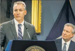  ??  ?? Danger: NYPD boss Dermot Shea (l.) worries about NY’s criminal-justice reforms, and Mayor de Blasio’s $8.7 billion plan to shut Rikers won’t help.