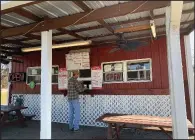  ?? (Arkansas Democrat-Gazette/Eric E. Harrison) ?? Mick’s BBQ & Catfish, on MacArthur Drive in North Little Rock, is an old-fashioned barbecue shack.