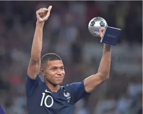  ?? JEWEL SAMAD/AFP/GETTY IMAGES ?? France forward Kylian Mbappe was named the Best Young Player of the 2018 World Cup.