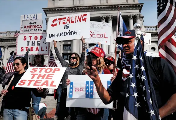  ??  ?? CARRYING ON (Above) Protests at Pennsylvan­ia’s State Capitol in Harrisburg calling to stop the vote as Trump’s lead slipped away proved unsuccessf­ul. (Right) Environmen­talists worry that Trump will press forward with plans to open Tongass National Park in Alaska to logging.