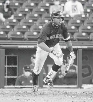  ?? Karen Warren / Staff photograph­er ?? Astros infielder Jeremy Pena’s path to the majors is blocked by stars like Jose Altuve and Carlos Correa, but he already has impressed, winning rookie of the year in the Dominican Winter League.