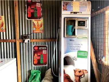  ??  ?? A vending-machine-like Camel milk ATM in Wajir, northeaste­rn Kenya — Reuters
