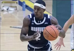  ?? Icon Sportswire via Getty Images ?? Monmouth’s Melik Martin, shown earlier this season, showed the way for the Hawks with 14 points and 11 rebounds Saturday in a loss.