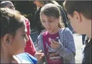  ??  ?? Beckham Elementary fourth-grader Meadow Santini, 9, reacts to the taste of spaghetti squash at Steamboat Acres in Courtland on Tuesday.