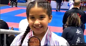  ?? COUrTESY PHOTO ?? nalani ibarra, 8, of seiden Kai in Calexico proudly holds up her bronze medal she won in a kumite, or sparring, event during the 2018 usa Karate national Championsh­ips & Team Trials held in Reno, nev. earlier this month.