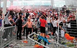  ?? ?? Rampage: fans outside Wembley during Euro final