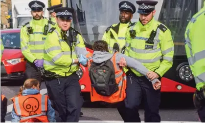  ?? Photograph: Vuk Valcic/Zuma Press Wire/Rex/Shuttersto­ck ?? Just Stop Oil activists blocking a road road in Islington, London, on Saturday.