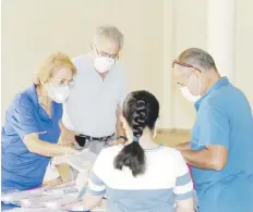  ??  ?? Entrega de materiales y efectos escolares en el inicio del año escolar por el Club Rotario de Yauco y el Club Rotaract Comunitari­o de Yauco.