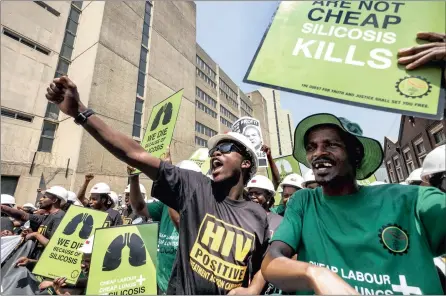  ?? PICTURE: SHAYNE ROBINSON, SECTION27 ?? STREET PROTEST: Members of the Treatment Action Campaign, Section27 and Sonke Gender Justice march in Joburg yesterday in a protest highlighti­ng the issue of miners suffering from silicosis and TB.