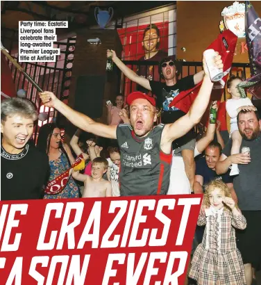  ??  ?? Party time: Ecstatic Liverpool fans celebrate their long-awaited Premier League title at Anfield