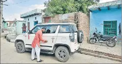  ?? BIPLOV BHUYAN/HT ?? ■ Rohi village resident Shriram gave up studies, having failed in Class 10 board exams, and has mulled several business ideas. He bought an SUV with the compensati­on money.