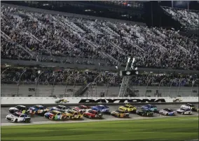  ?? TERRY RENNA - THE ASSOCIATED PRESS ?? Alex Bowman (88) and Jimmie Johnson (48) lead the field to start the second of two NASCAR Daytona 500 qualifying auto races at Daytona Internatio­nal Speedway, Thursday, Feb. 13, 2020, in Daytona Beach, Fla.