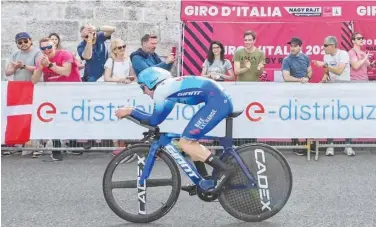 ?? Associated Press ?? ↑
Britain’s Simon Yates competes in the second stage of the Giro d’italia in Budapest on Saturday.