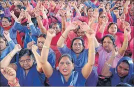  ?? HT PHOTO ?? Anganwadi workers and helpers during their statelevel rally in Karnal on Monday. They have been demanding the regularisa­tion of their jobs, hike in salaries and retirement benefits.