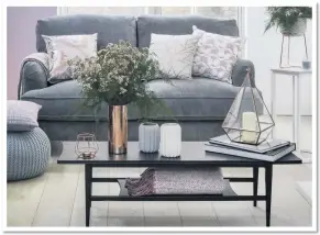  ??  ?? Glynn two-seater sofa, £350; knitted pouffe, £39; pink and grey chunky woven throw, £18; copper-toned glass terrarium lantern, £20; copper vase, £6; copper and concrete planter, £25; cushions (l) pink marble effect, £7; (r) floral cushion, £6; (middle) grey diamond textured cushion, £6, George Home